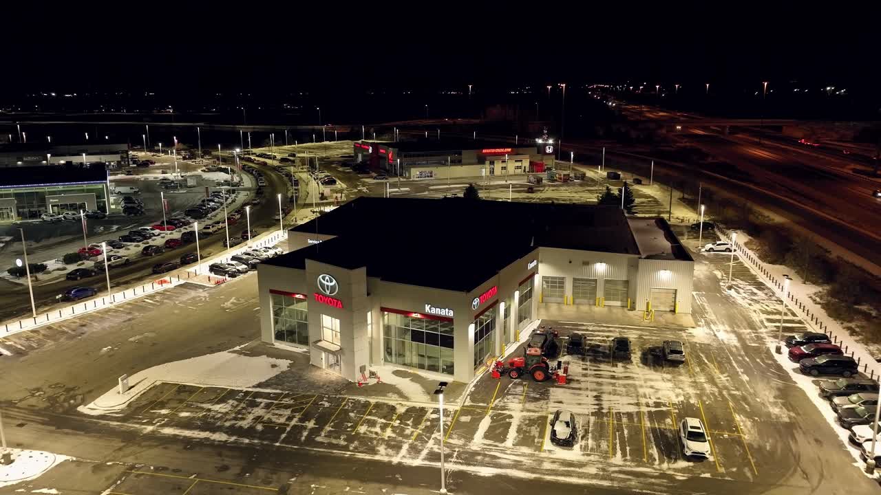 Aerial Night View of Toyota Kanata Car Dealership and Parking Lot in Winter