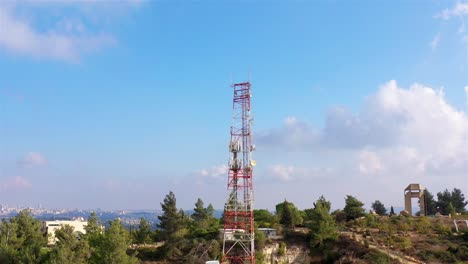 telecommunication tower in a hilly landscape