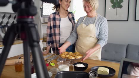 tilt up video of two women vlogger creating social media