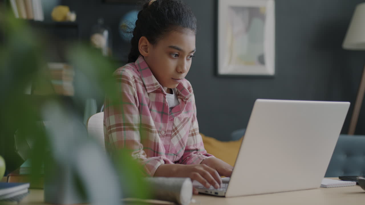 Girl Studying on Laptop