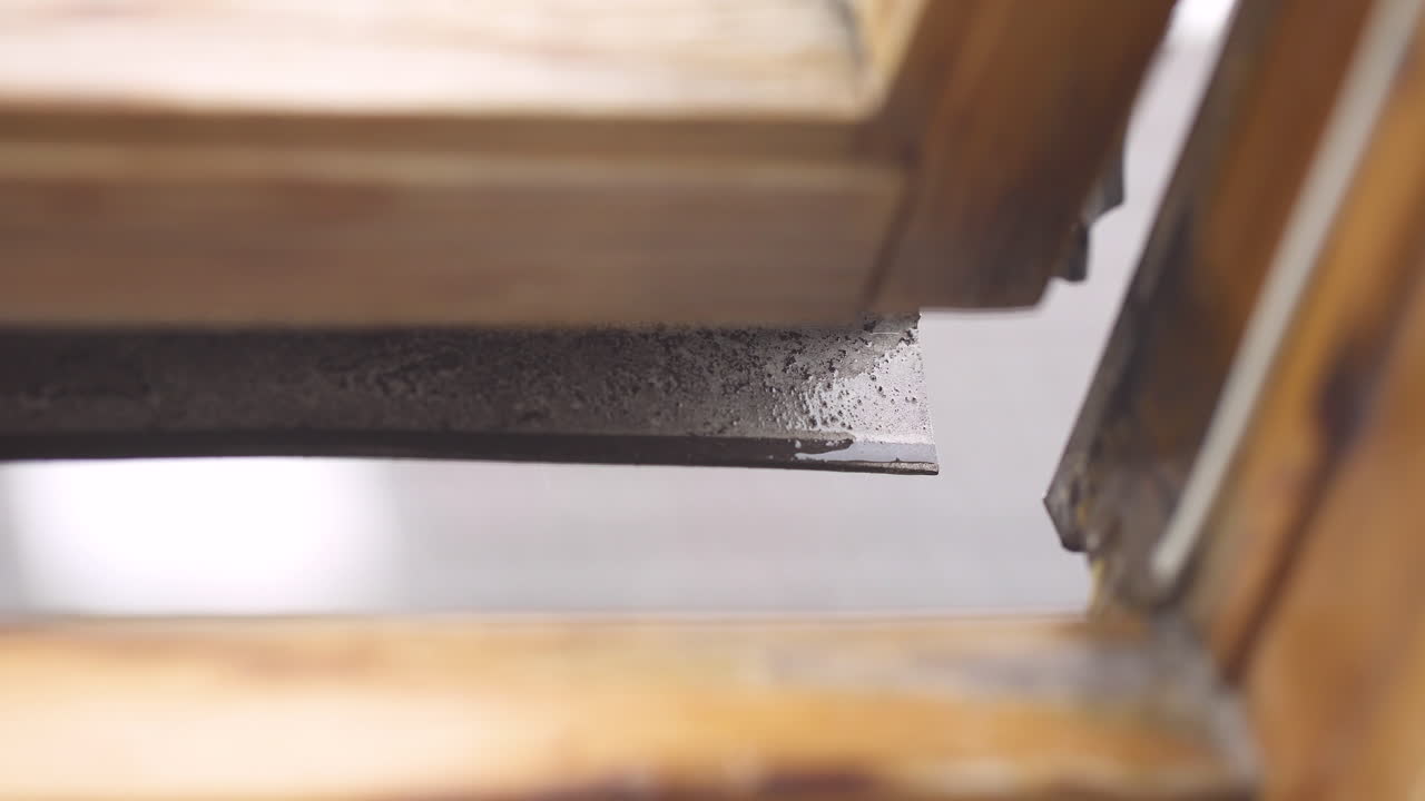 Close-up of Open Window with Leaking Rain