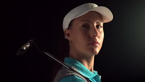 woman golfer looking at camera