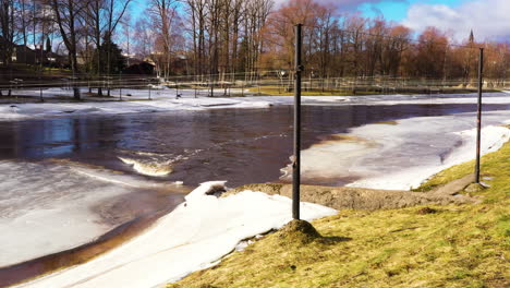 Valmiera-river-Gauja-with-canoe-track-gates-"Krācītes