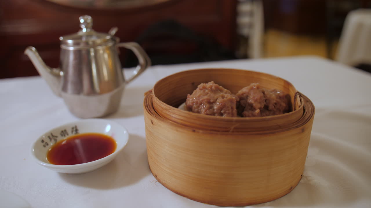 Delicious Steamed Meatball Dim Sum in Bamboo Steamer