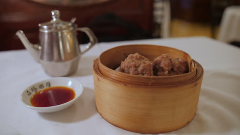 delicious steamed meatball dim sum in bamboo steamer