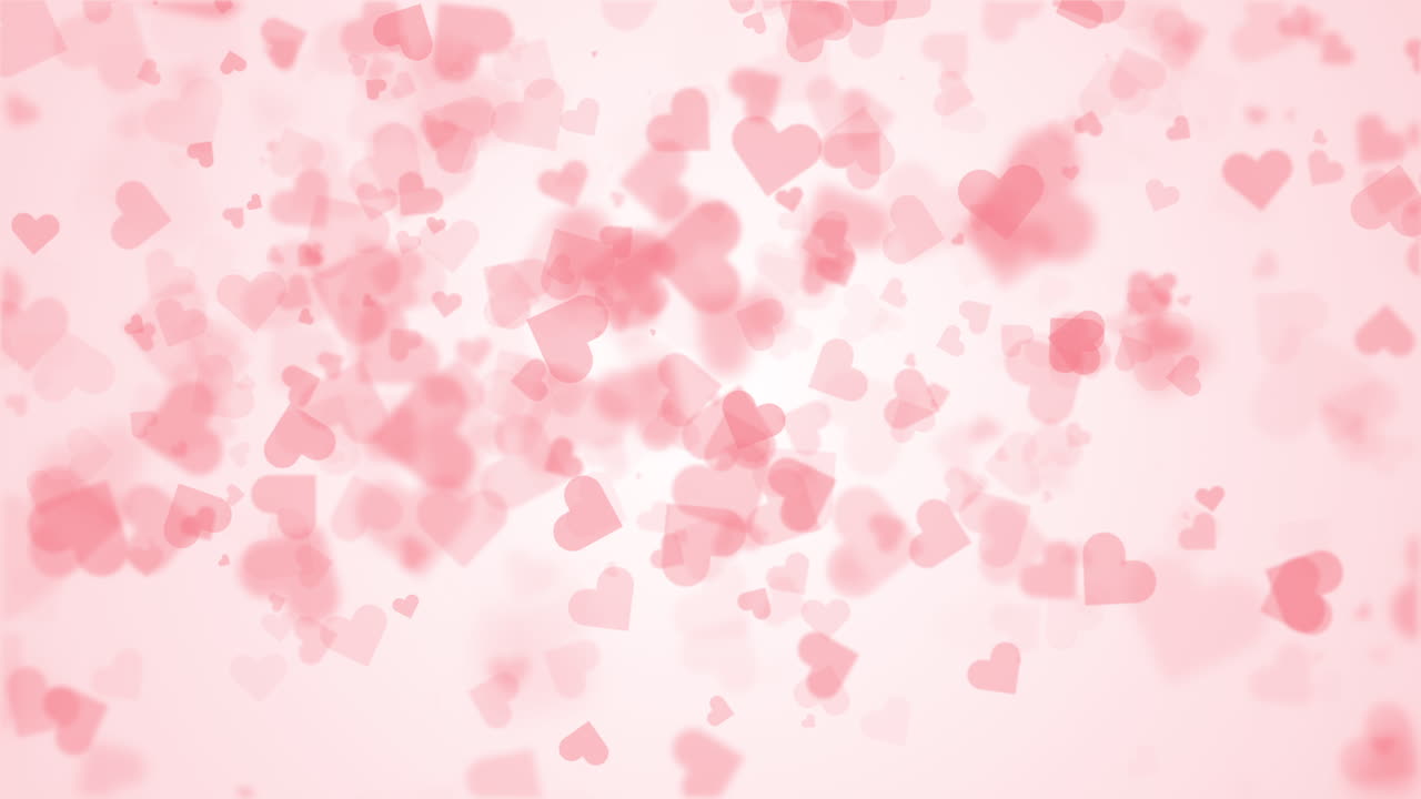 Pink abstract background with falling hearts. Looped holiday animation. Blurred particles symbols of love.