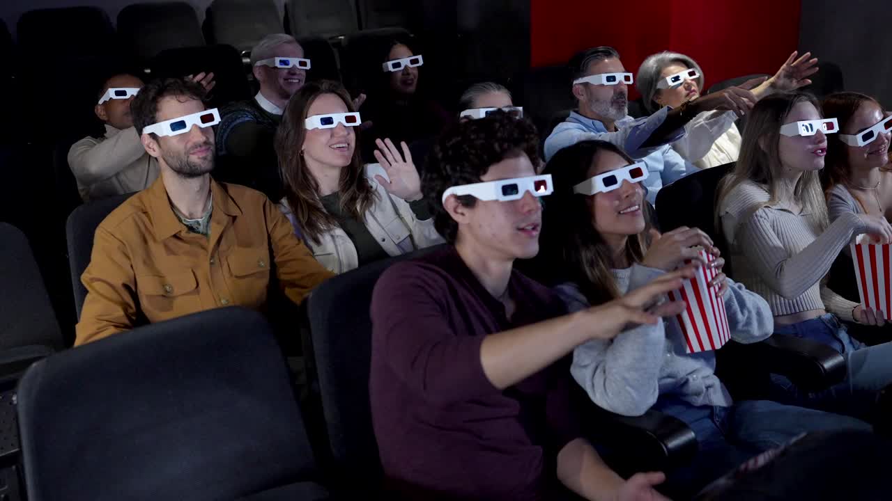People Watching a 3D Movie in a Theater