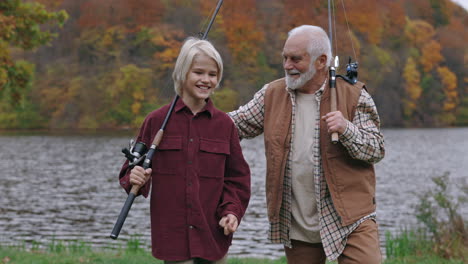 grandpa and grandson fishing in autumn