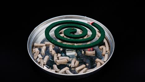 Mosquito-Coil-Repellent-timelapse-with-dark-room-Close-Up-Of-Mosquito-Coil-timelapse-at-dark-room