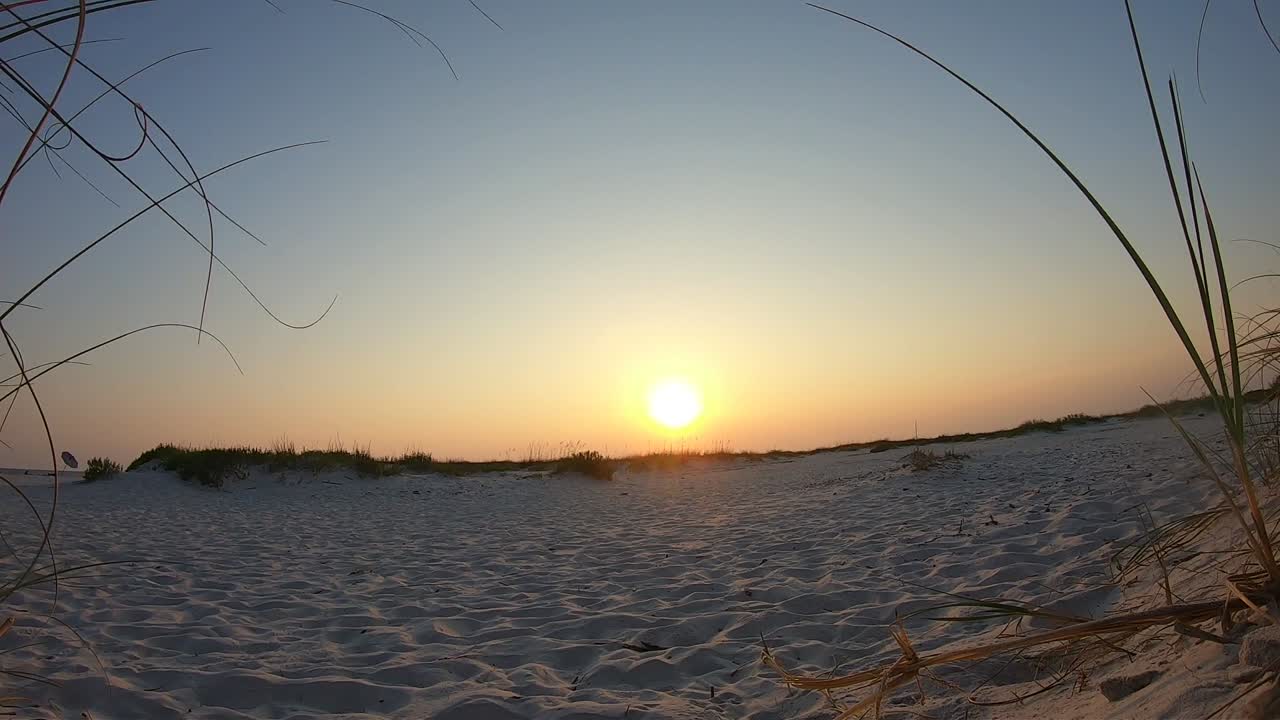 lapso de tiempo, puesta de sol en la playa en el golfo de méxico alabama ee.uu.