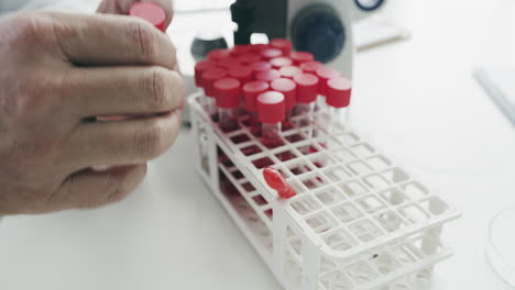 scientist working with test tubes in a laboratory