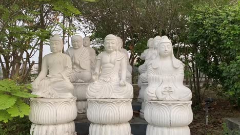 Row-of-Buddhist-monk-statues-at-Eco-park-Kolkata