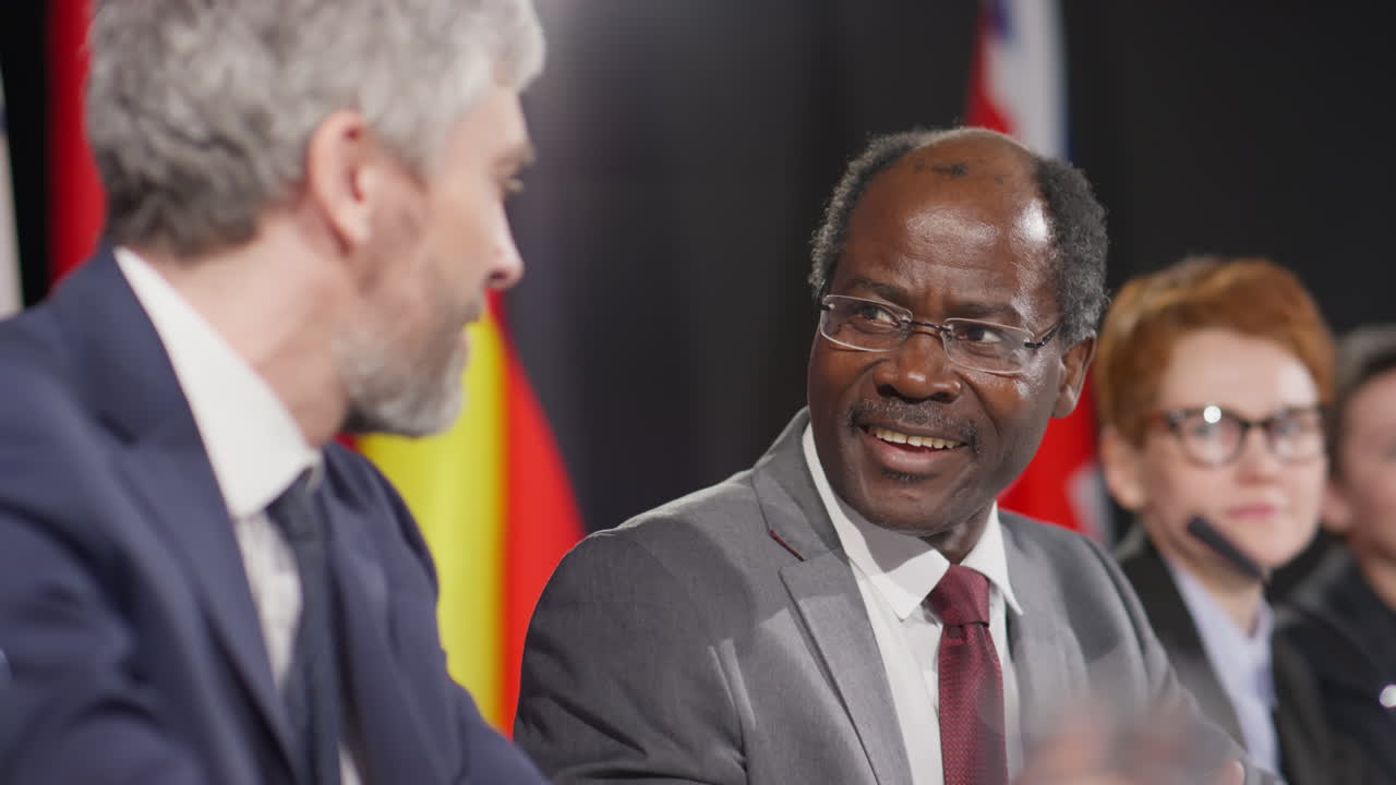 Multiethnic Diplomats Talking at Press Conference