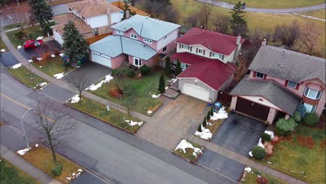 cinematic ascent over four neighboring houses
