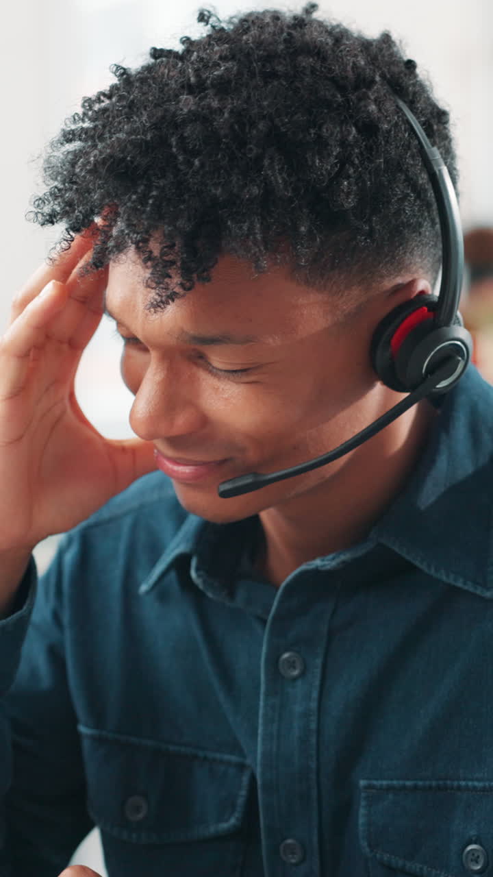 Young Man Experiencing Headache While Wearing Headset