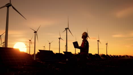 engineer working at a renewable energy facility at sunset