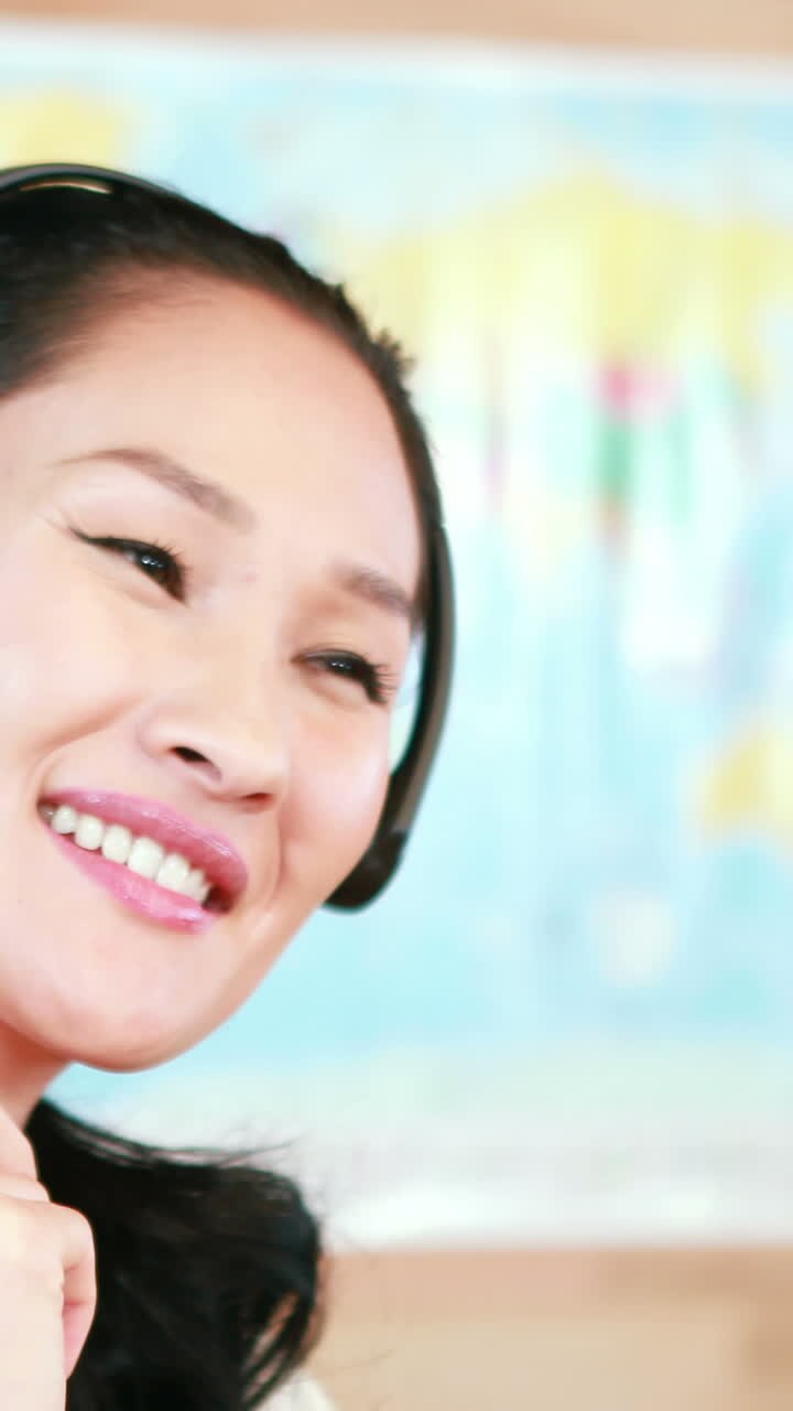 Casual businesswoman speaking with headset