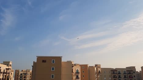 Air-Plane-take-off-against-sunset-in-the-evening-against-bright-clouds-view-from-a-distance-in-UAE