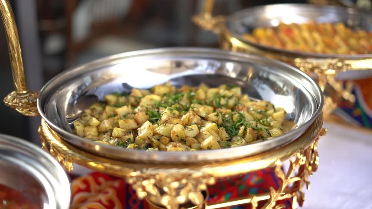 View of food in open buffet, close up shot, high angle shot