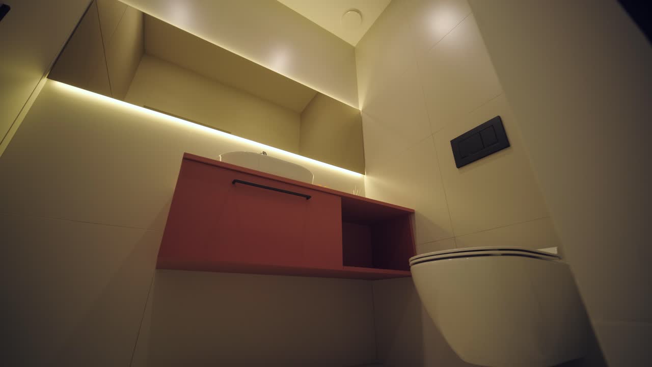 Interno di casa minimalista elegante e di stile, caratterizzato da linee pulite, colori neutri e illuminazione ambientale calda, che crea un'atmosfera accogliente e moderna