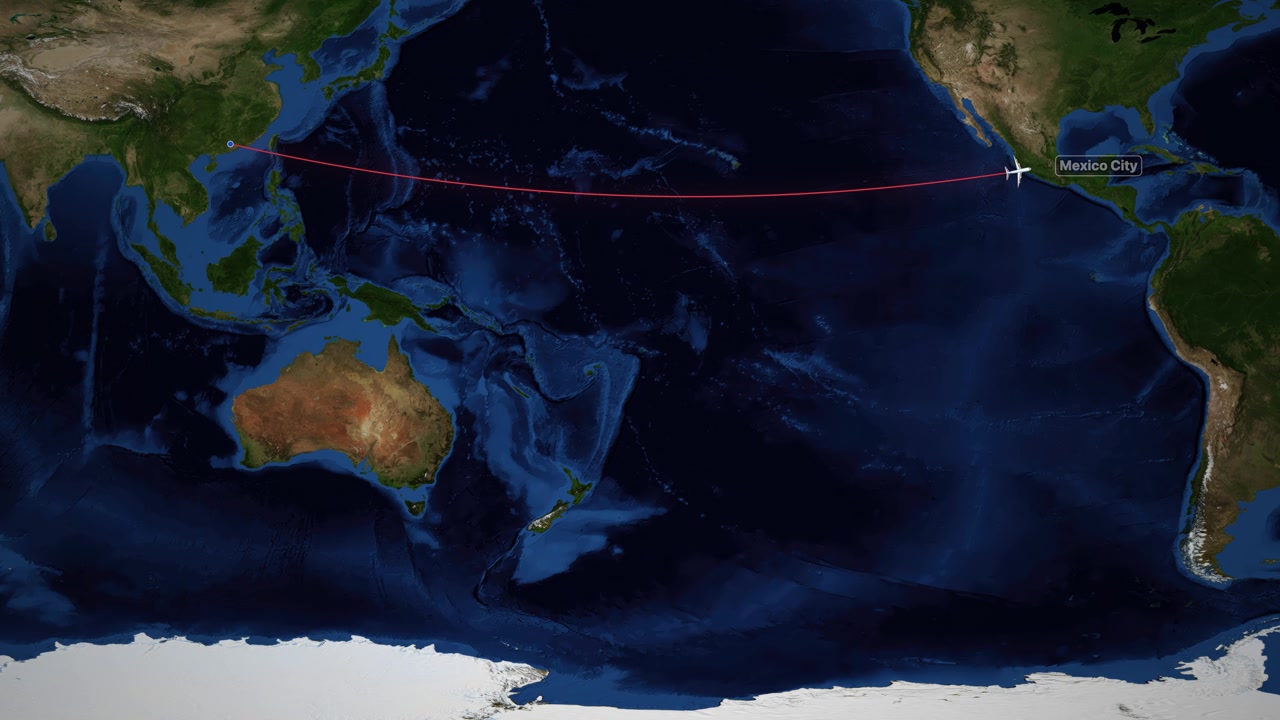 Satellite world map shows an airplane flying from Guangzhou to Mexico City via Pacific