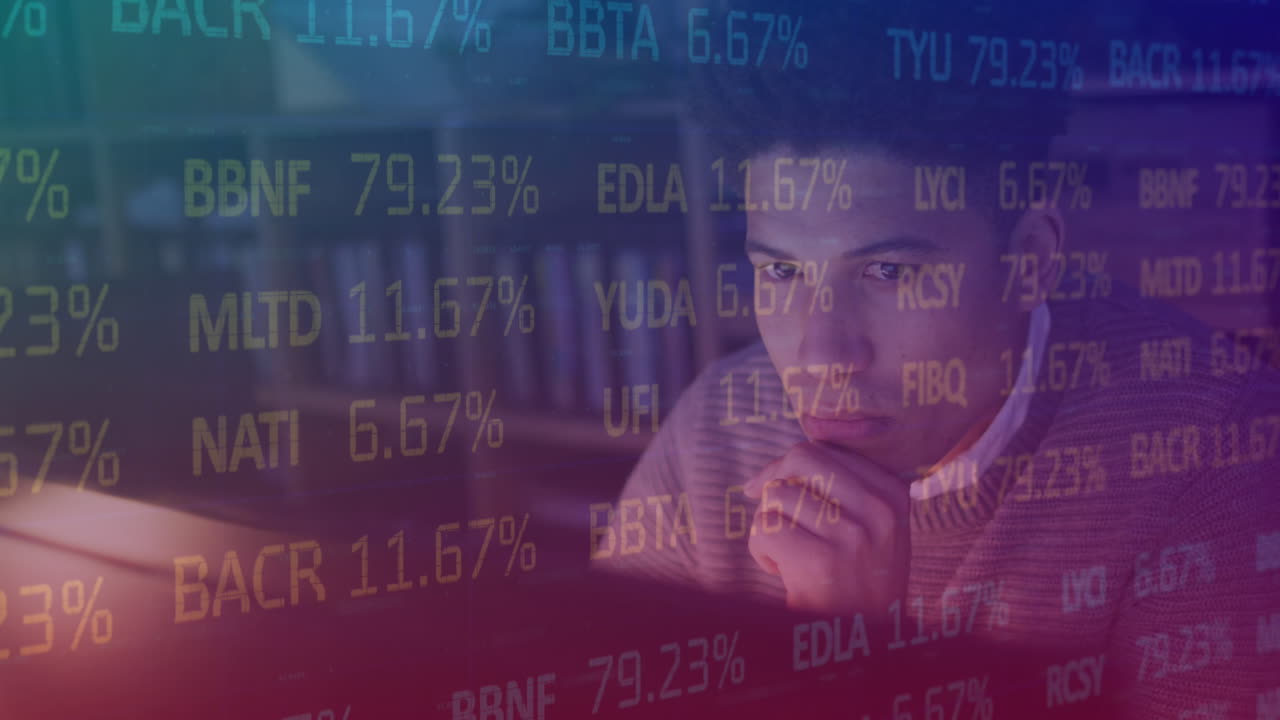 Animation of data processing over biracial businessman working in office