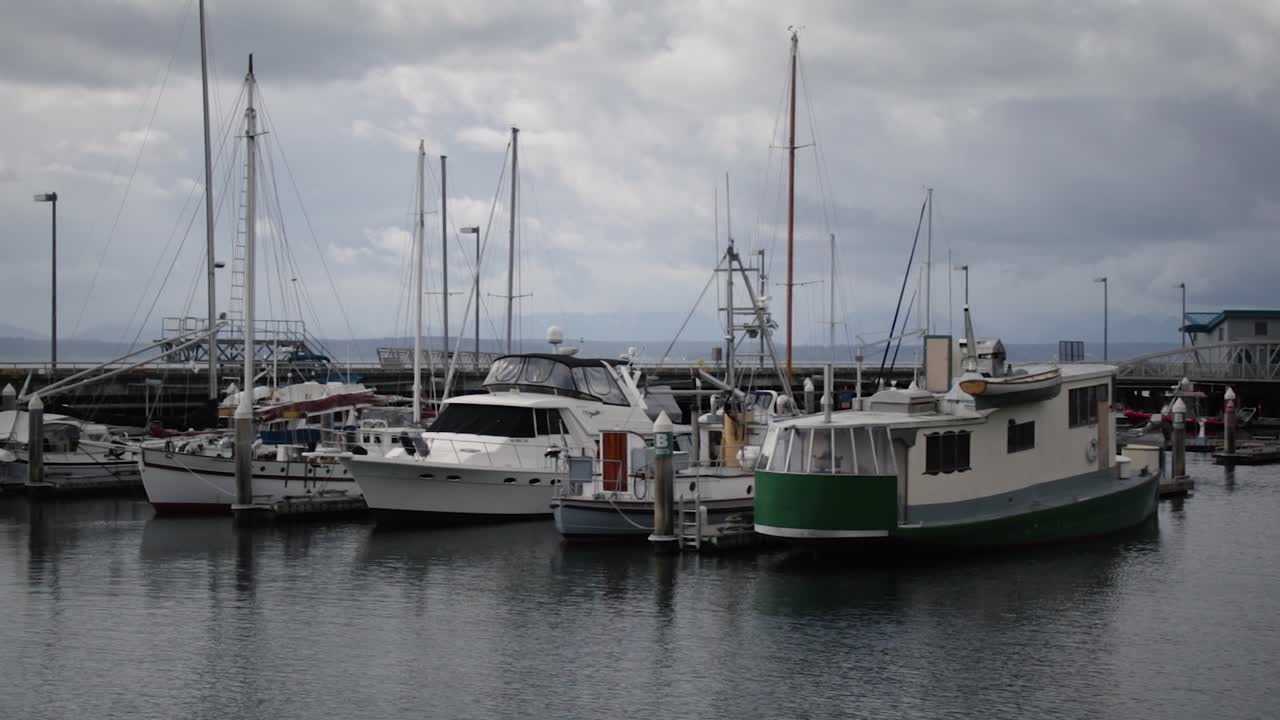 Slow motion sail boats in bay in Seattle