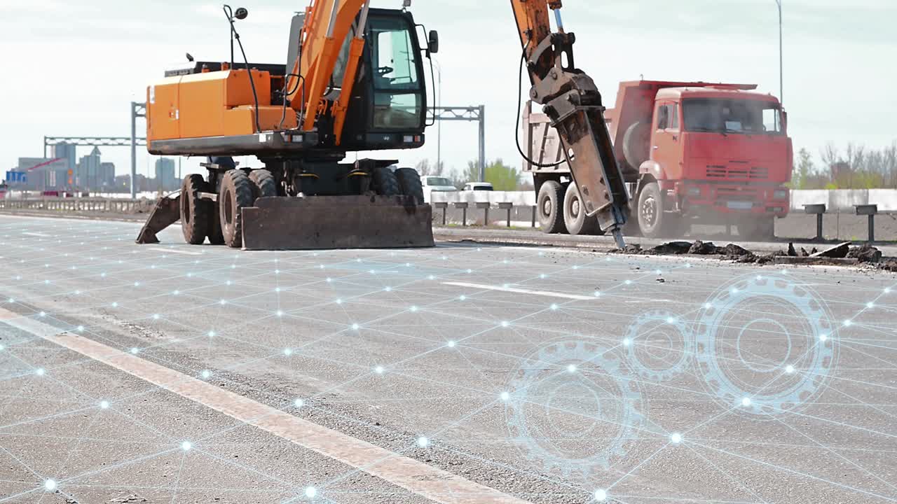 고속도로 건설에 미래의 기술과 인공지능을 적용하는 개념 - 수압 망치로 발굴기 작동