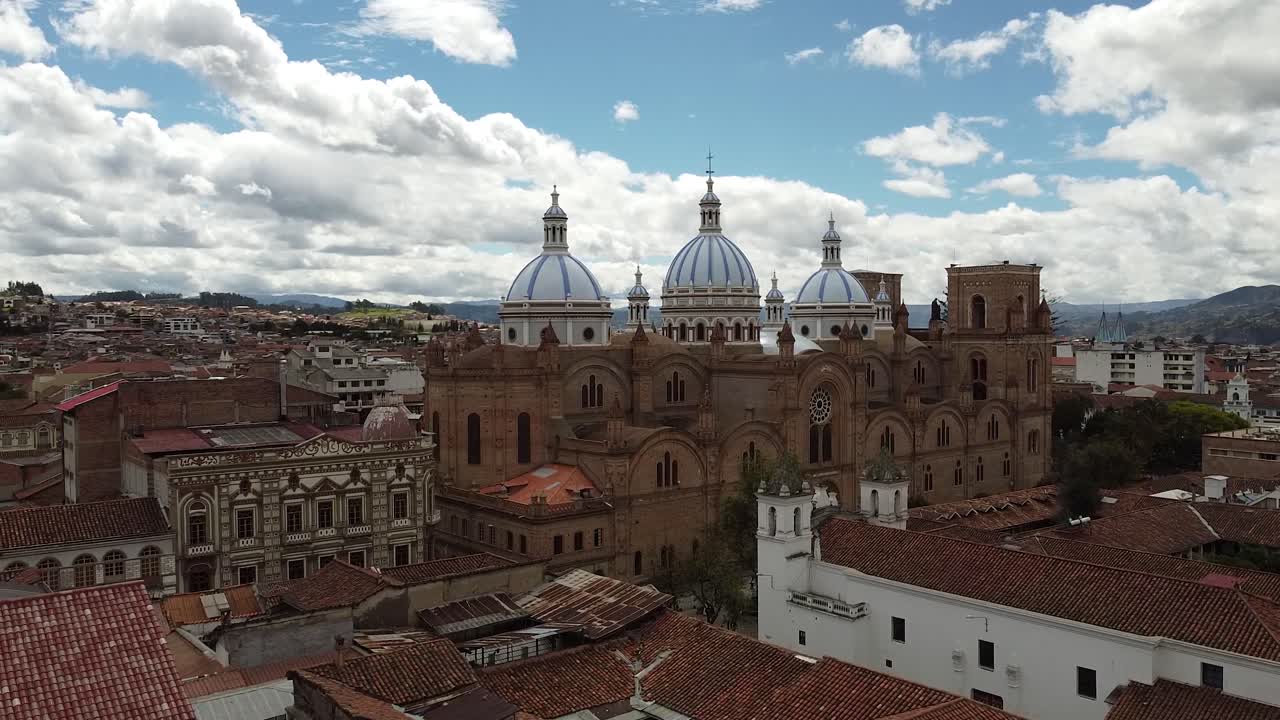 Aerial orbit of Iglesia Católica San Francisco church in Cuenca Ecuador. Catedral de la Inmaculada Concexpción. Cathedral of Immaculate Conception in Cuenca Ecuador.