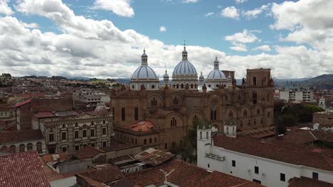 aerial orbit of iglesia católica san francisco church in cuenca ecuador. catedral de la inmaculada concexpción. cathedral of immaculate conception in cuenca ecuador.