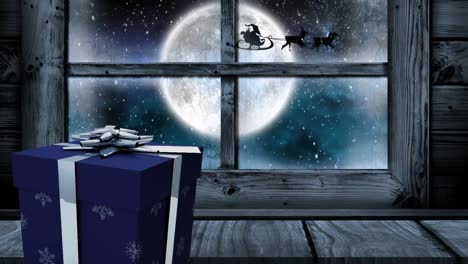 Animation-of-christmas-gift-and-window,-with-falling-snow,-full-moon-and-santa's-sleigh-outside