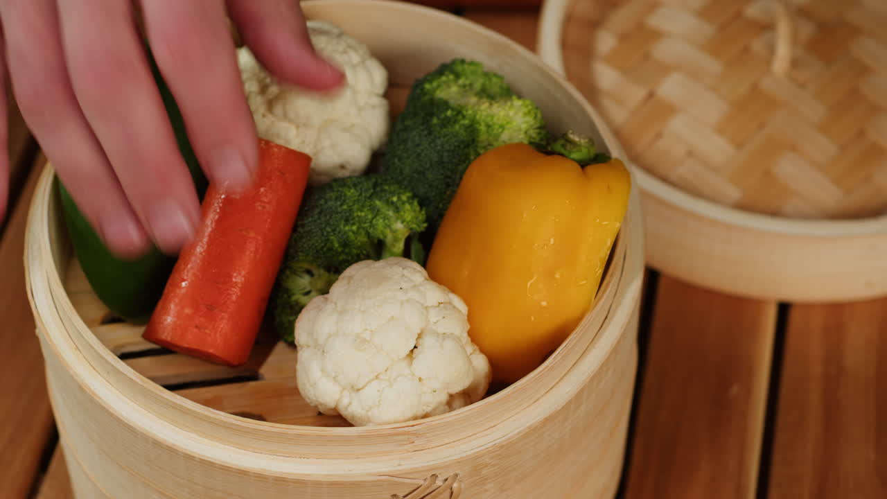 Preparing Steamed Vegetables in Bamboo Steamer
