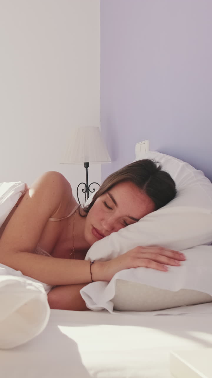Woman Sleeping Peacefully in Bed