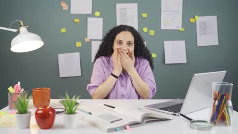 the female student who is surprised and happy at the news.