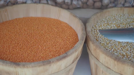 red lentils in wooden bowls at a market