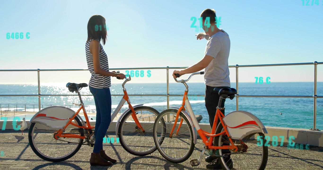 Couple stopping cycling, conversing and activating turquoise overlays showing currency carbon units