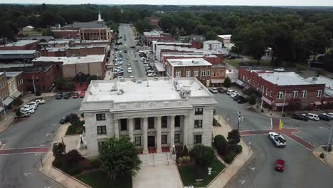 aerial push in over alamance county courthouse in graham north carolina