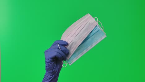 hand holding medical face masks