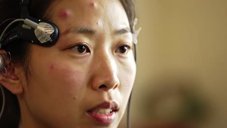 woman undergoing brain monitoring procedure