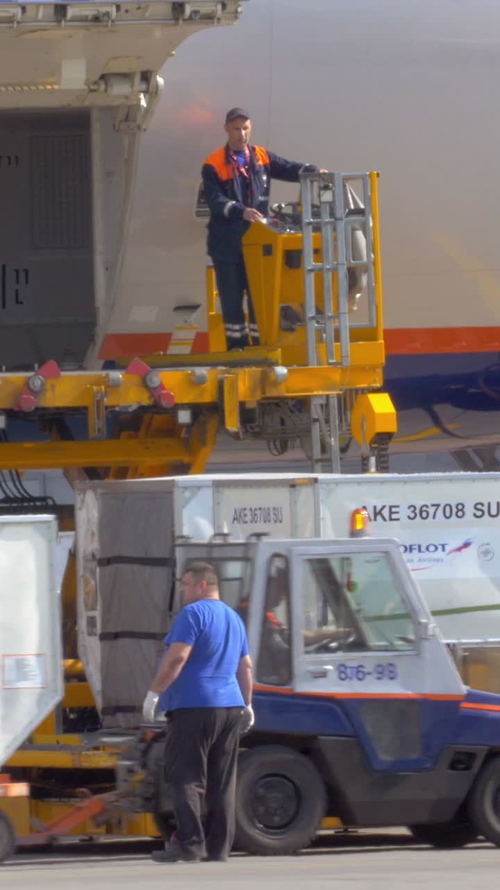 Loading Cargo on Airplane