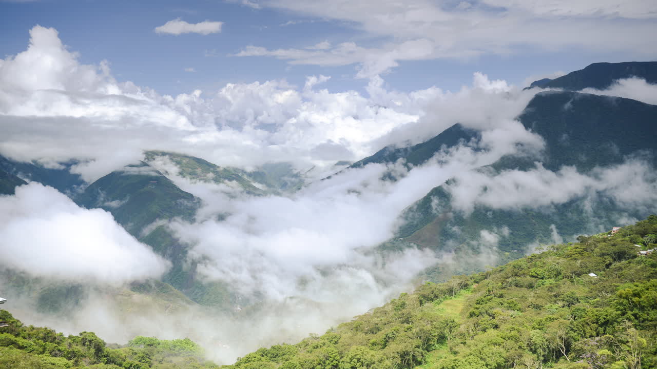 Timelapse of clouds forming in a valley in the Andes Mountains landscape of Bolivia. Time lapse of Amazon rainforest scenery in South America