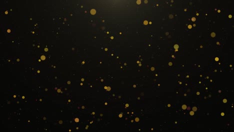partículas desfocalizadas doradas en fondo oscuro - bucle de 4k