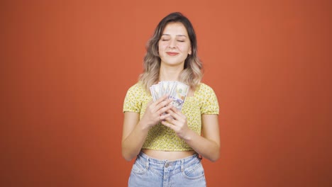 the young woman loves money.