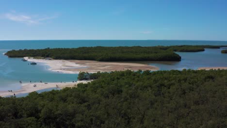 aerial 4k uhd drone of an official dog beach in the everglades region, close to miami and key west in florida. the turquoise atlantic ocean is surrounding the hundreds of coral reef mangrove islands