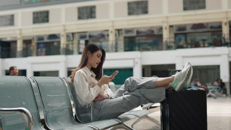 woman relaxing at airport