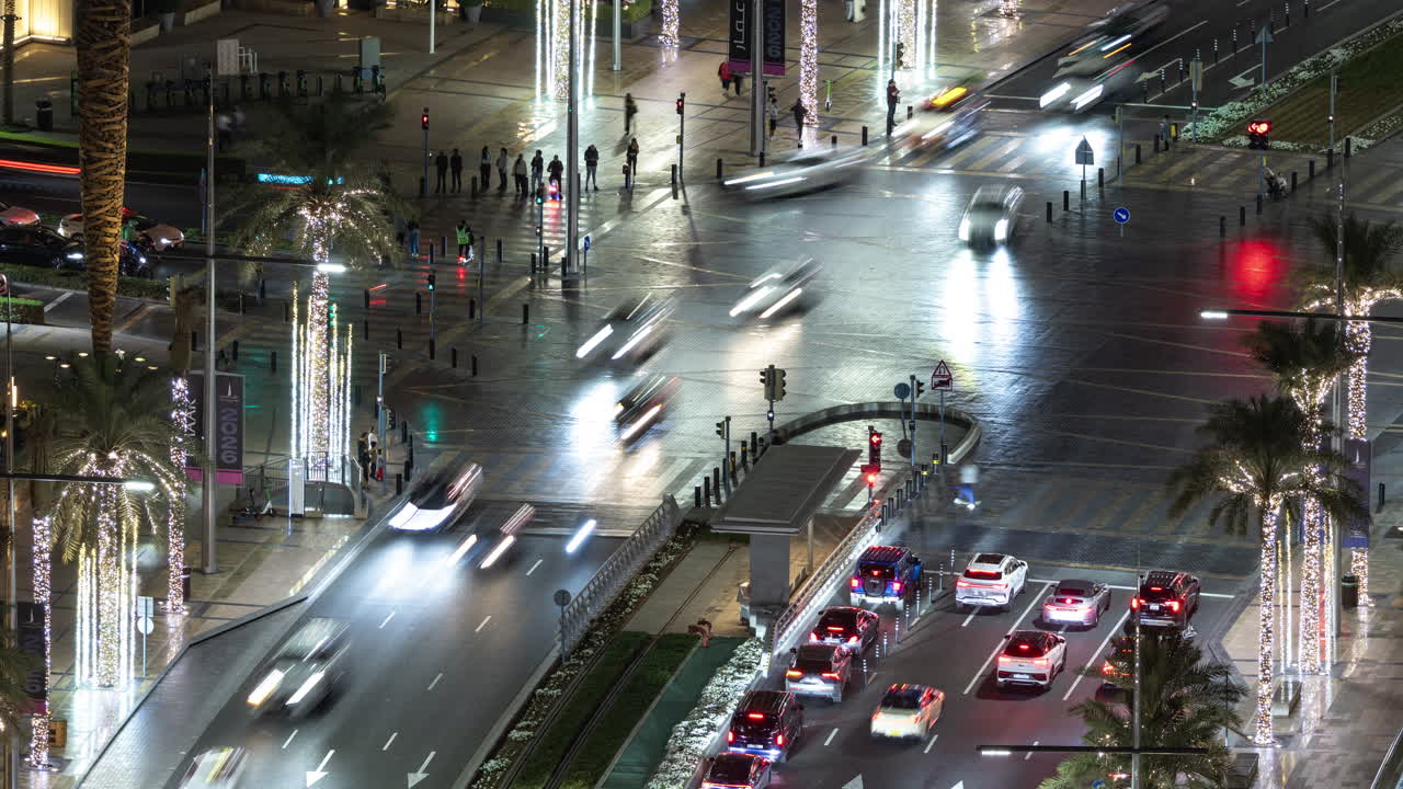 Time Lapse of Busy City Intersection at Night with Traffic and Pedestrians