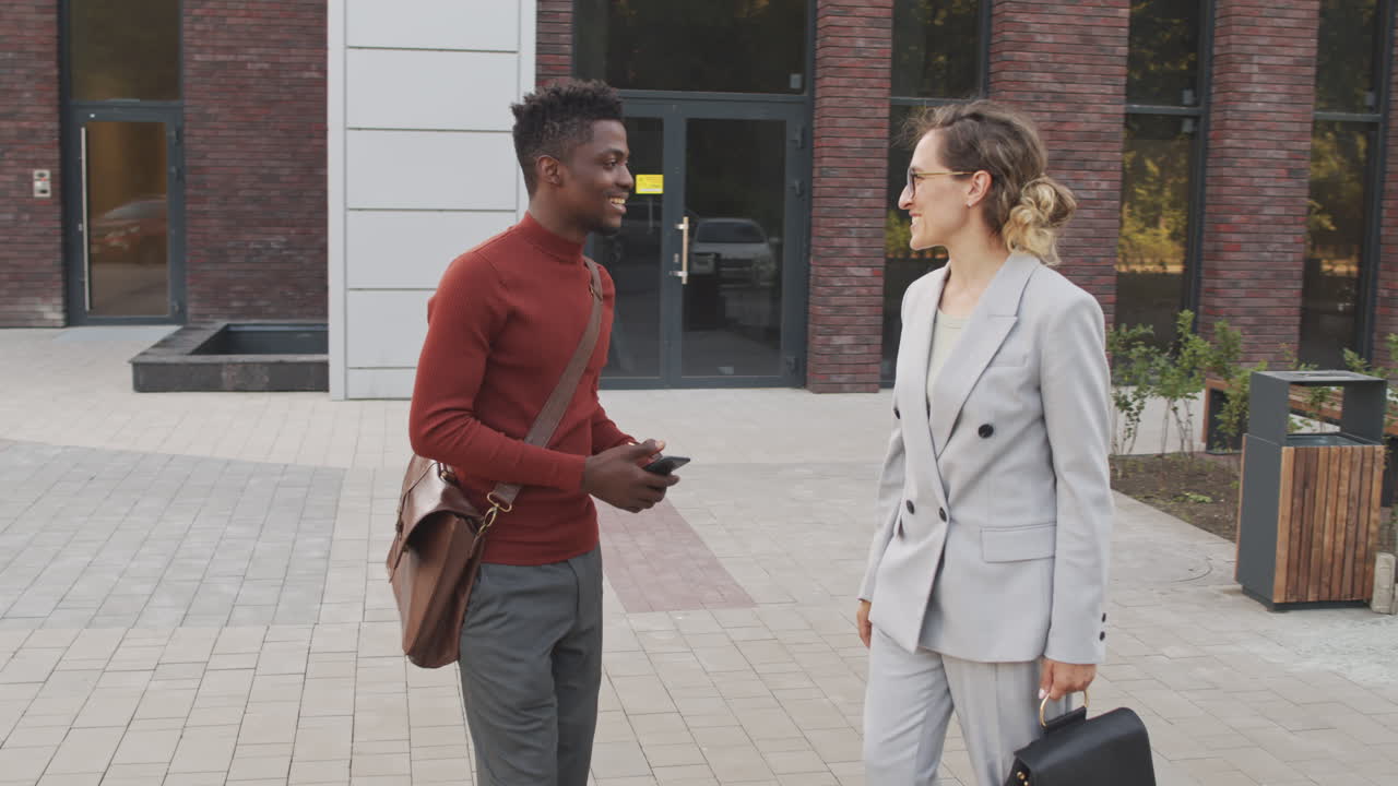 Multi-Ethnic Business Couple Meeting Outdoors
