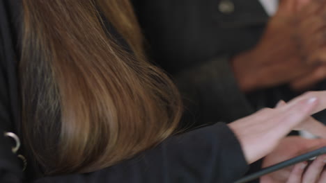 close-up-business-people-hands-using-digital-tablet-computer-african-american-team-leader-woman-sharing-ideas-training-students-in-diverse-office-workplace