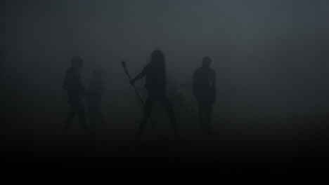 silueta de una banda de música rock. concierto de rock musical. escenario de un espectáculo de música rock