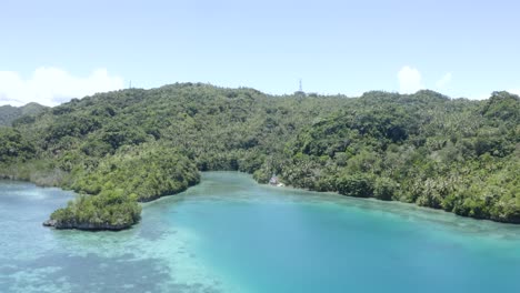 Picturesque-Landscape-Of-Lush-Coastal-Mountains-By-The-Turquoise-Blue-Water-In-The-Philippines